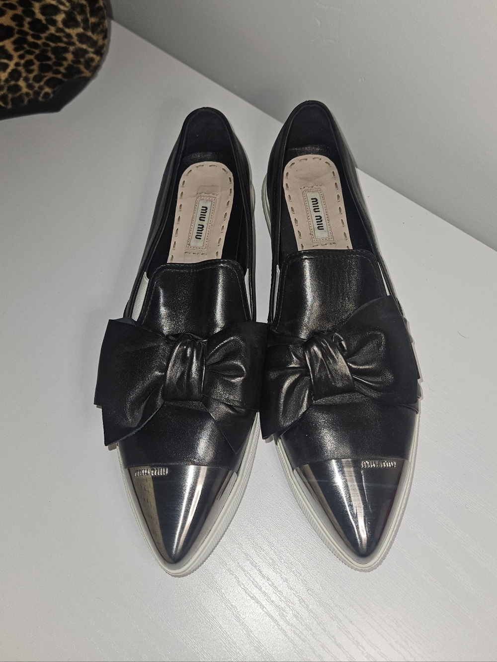 Miu Miu Black Leather Bow Loafers with Metallic Silver Pointed Toe